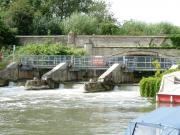 St Johns Bridge with the weir in front of it - near Lechlade, England.