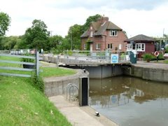 Serene looking Clifton Cut Lock by the Thames Path in England.