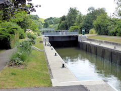 Days Lock at Little Wittenham with the old iron footbridge in the background.